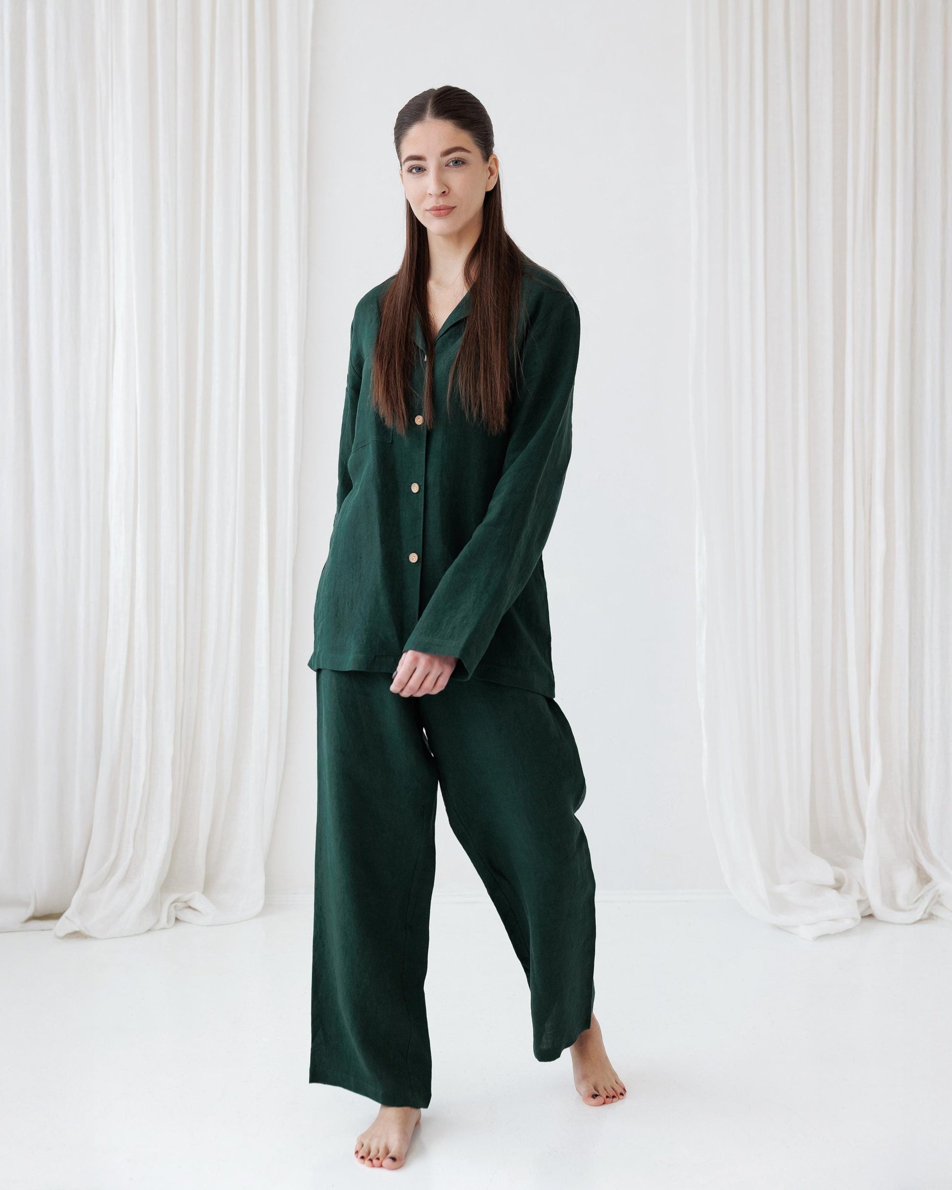 Woman wearing a green pajama set